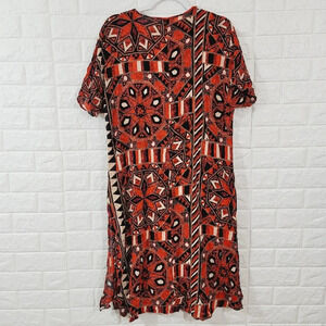 H&M  hi-low top/ cover up.Size M